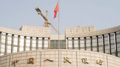 China’s Central Bank Cuts Key Fee as Financial Files Disappoint